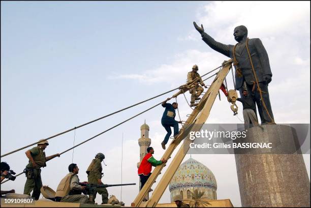 Operation Iraqi Freedom Us Troops Enter Central Baghdad And Topple Statue Of Saddam Hussein On April 9, 2003 In Baghdad, Iraq. Liberated By U.S. Led...