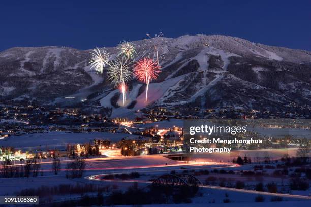 fireworks over steamboat springs ski resort - steam liner stock pictures, royalty-free photos & images