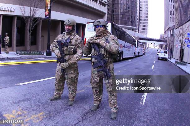 Department of Homeland Security Agents guard the street behind the New England Patriots Hotel after the New England Patriots Super Bowl LIII Press...