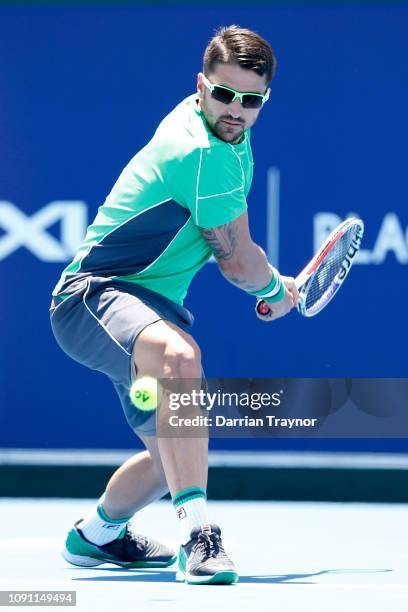 Janko Tipsarevic of Serbia plays a backhand in his match against Jason Kubler of Australia during day one of the 2019 Kooyong Classic at Kooyong Lawn...