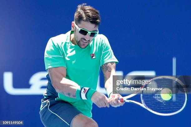 Janko Tipsarevic of Serbia plays a backhand in his match against Jason Kubler of Australia during day one of the 2019 Kooyong Classic at Kooyong Lawn...