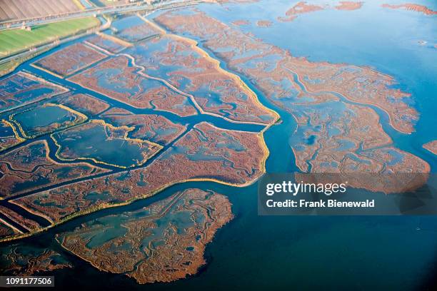 Aerial view from an aeroplane on the Venetian Lagoon, Laguna di Venezia.