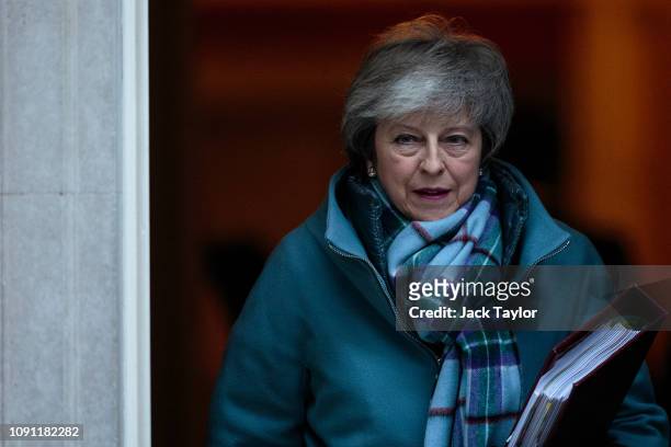 British Prime Minister Theresa May leaves Number 10 Downing Street for Prime Minister's Questions on January 30, 2019 in London, England. Mrs May is...