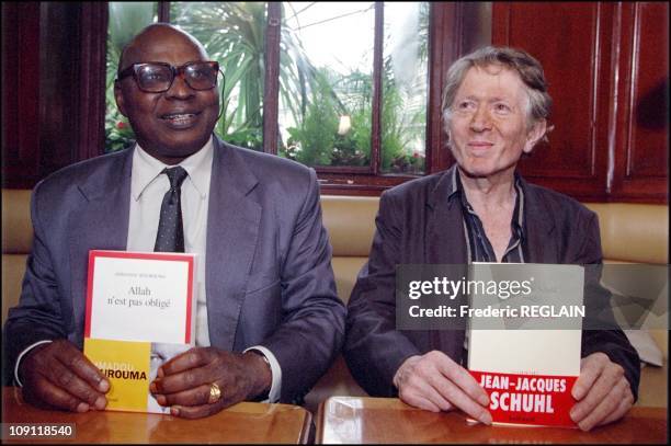 Goncourt And Renaudot Awards Ceremony On October 30Th, 2000 In Paris, France. Ahmadou Kourouma And Jean-Jacques Schuhl At Flore Cafe