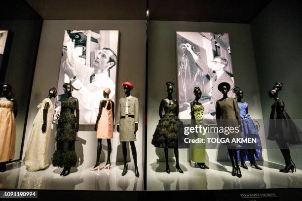 Costumes by Dior designers Marc Bohan and Yves Saint Laurent are on show at 'Christian Dior: Designer of Dreams' exhibition at the Victoria and...