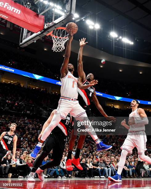 Emmanuel Mudiay of the New York Knicks with a reverse lay-up against the Portland Trail Blazers at Moda Center on January 07, 2019 in Portland,...