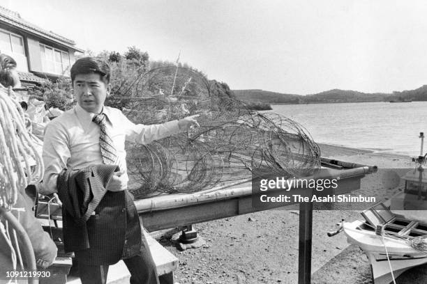 Environmental Agency chief Shintaro Ishihara inspects beaches of Minamata Disease on April 23, 1977 in Minamata, Kumamoto, Japan.