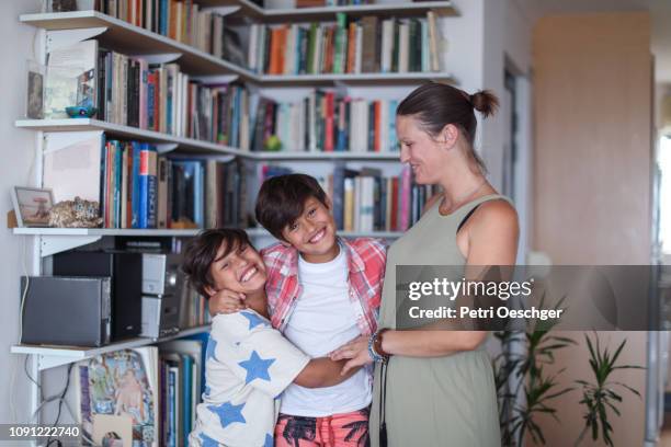 family portrait. - identical twin stock pictures, royalty-free photos & images