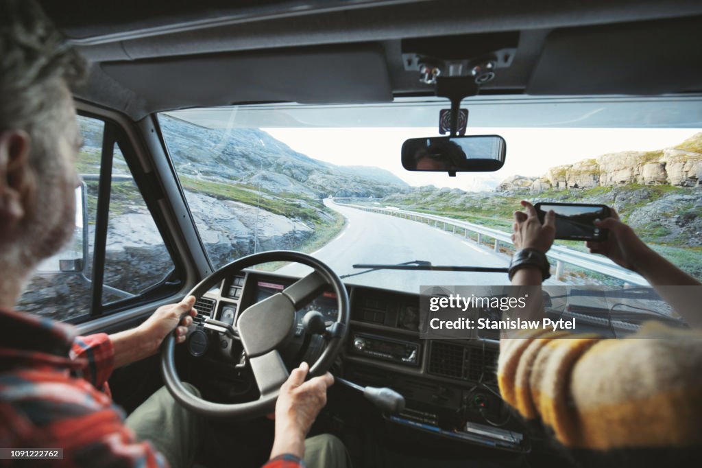 View from inside of campervan when traveling on beautiful road