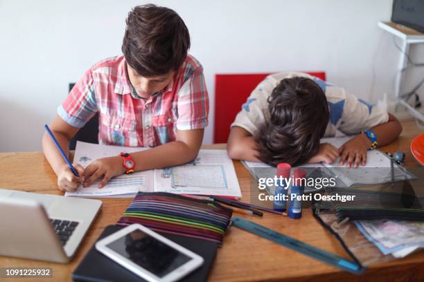 Twins Doing Math Twin Sisters Studying Together Photos and Premium High Res Pictures ...