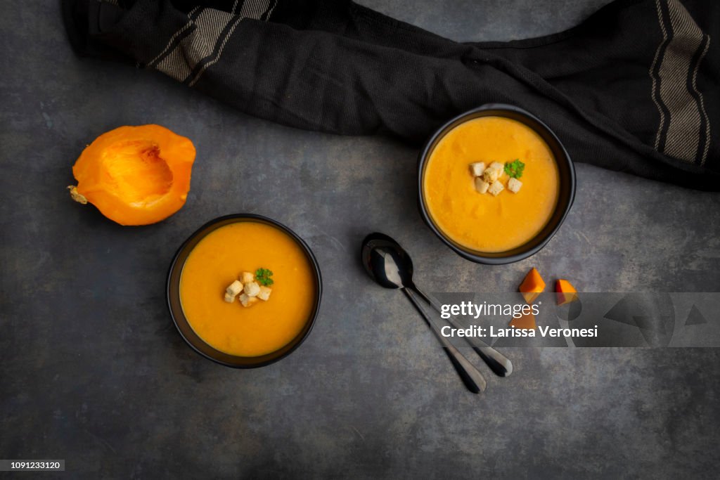 Pumpkin soup with croutons and parsley