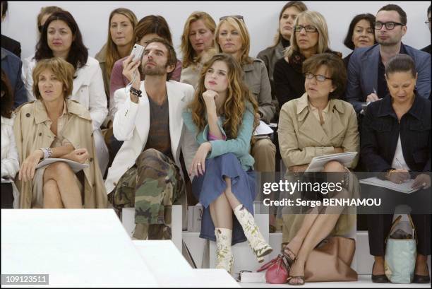 Celebs At The Chanel Haute Couture Fall Winter 2004/2005 Fashion Show. On July 7, 2004 In Paris, France. Cecile Cassel And Friend John Nollet