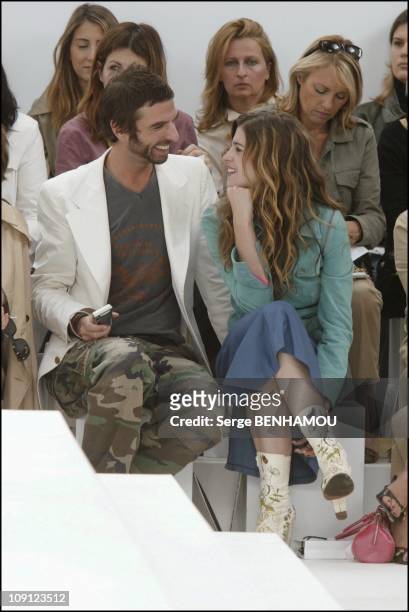Celebs At The Chanel Haute Couture Fall Winter 2004/2005 Fashion Show. On July 7, 2004 In Paris, France. Cecile Cassel And Friend John Nollet
