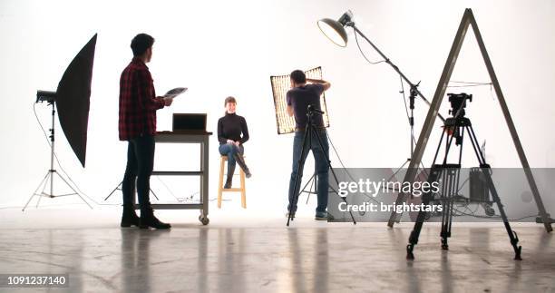 photographer in the studio - photoshoot bts stock pictures, royalty-free photos & images