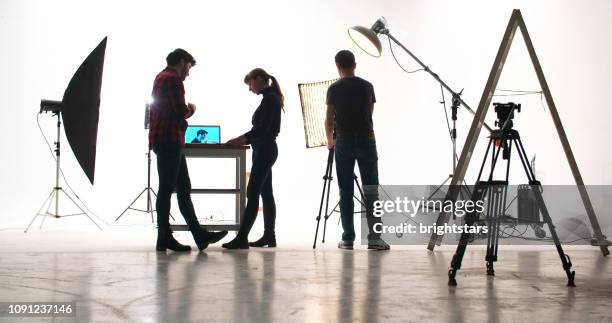 film crew in the studio - photo shoot studio stock pictures, royalty-free photos & images