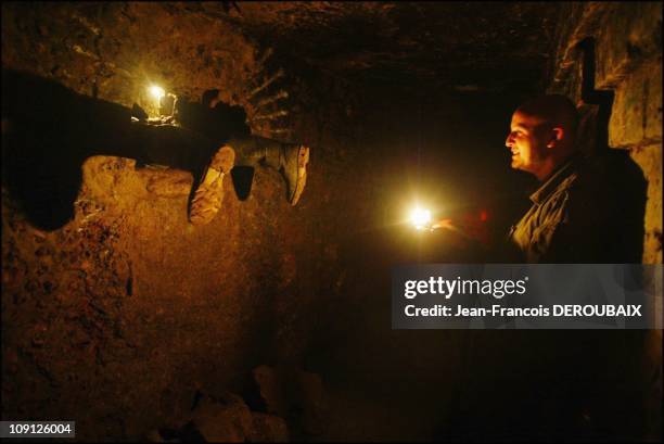 The Artists Of The Paris Catacombs On November 1, 2004 In Paris, France. Some Galleries Are Obstructed. To Reach Another Corridor, The Cataphiles...