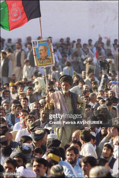 Partisans Of Former Afghan King Zaher Shah Demonstrate In Quetta On July 10Th, 2001 In Quetta, Pakistan. With The Former Afghanistan Flag.