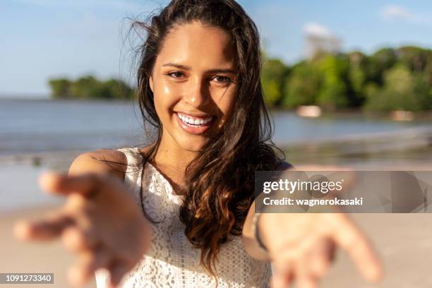 portrait of young brazilian woman on the beach. paraiso beach, mosqueiro - para state stock pictures, royalty-free photos & images