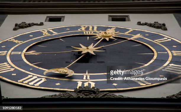 The eastern clock face at The Zytglogge clock tower at Kramgasse Street on January 01, 2019 in Bern, Switzerland. The Zytglogge lock tower is a...