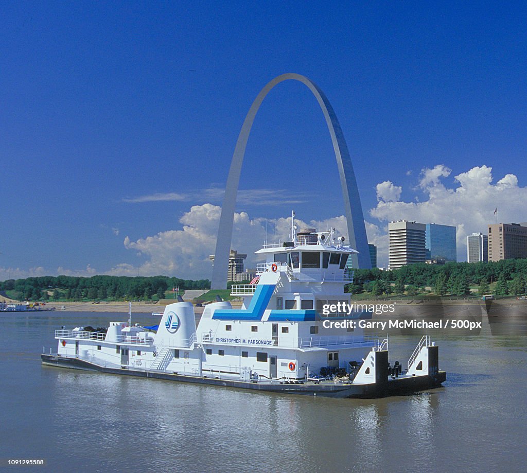 Towboat C Parsonage in front of the Arch