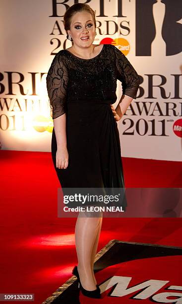 British singer Adele arrives at the o2 arena in east London ahead of the Brit Awards on February 15, 2011. The event is being held at the o2 for the...