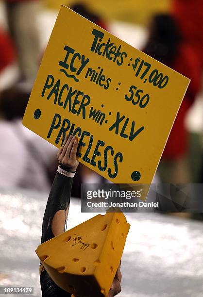 Green Bay Packers fan celebrates their 31-25 win against the Pittsburgh Steelers during Super Bowl XLV at Cowboys Stadium on February 6, 2011 in...
