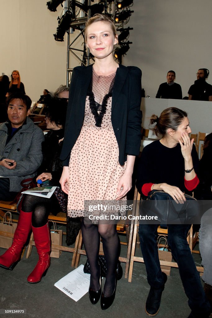 Kirsten Dunst attends the Rodarte Fall 2011 fashion show during... News ...