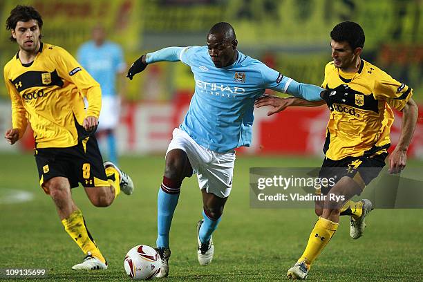 Mario Balotelli of Manchester City attacks as Juan Carlos Toja and Nikos Lazaridis of Aris defend during the first leg, round of 32 UEFA Europa...