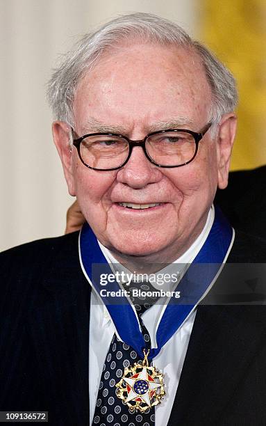 Warren Buffett, chairman and chief executive officer of Berkshire Hathaway Inc., receives the Presidential Medal of Freedom from U.S. President...