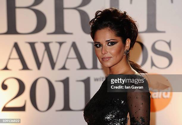 Singer Cheryl Cole arrives on the red carpet for The BRIT Awards 2011 at the O2 Arena on February 15, 2011 in London, England.