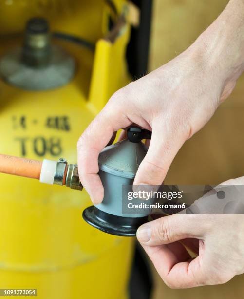 lpg gas bottle, butane gas cylinders - lpg-installation stock pictures, royalty-free photos & images
