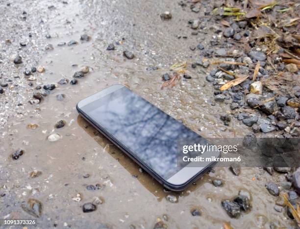 lost mobile phone - cell destruction stock pictures, royalty-free photos & images