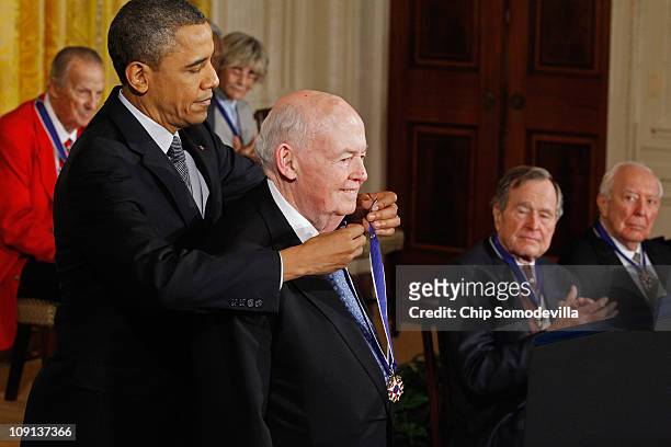 President Barack Obama presents AFL-CIO President Emeritus John Sweeney with the 2010 Medal of Freedom in the East Room of the White House February...