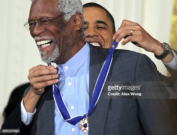 Former Boston Celtics captain Bill Russell is presented with the 2010 Medal of Freedom by U.S. President Barack Obama during an East Room event at...