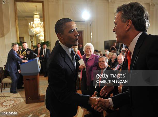 President Barack Obama greets members of the Bush Family including Marvin Bush during a Medal of Freedom Ceremony on Feburary 15, 2011 at the White...