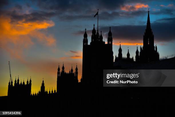 The Houses of Parliament are silohuetted as the sun sets, London on January 30, 2019. The EU's chief negotiator Michel Barnier says the Irish...