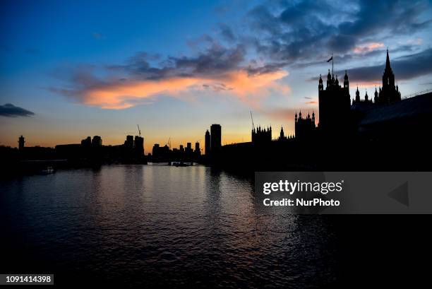 The Houses of Parliament are silohuetted as the sun sets, London on January 30, 2019. The EU's chief negotiator Michel Barnier says the Irish...