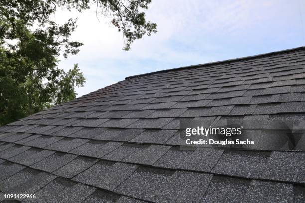 asphalt shingle roof - roof tile stock-fotos und bilder
