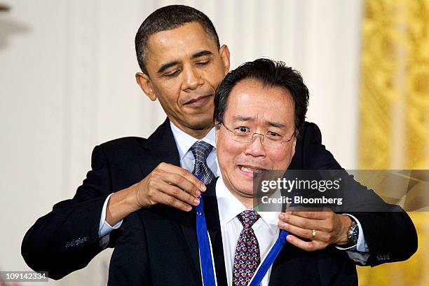 Cellist Yo-Yo Ma is awarded the Presidential Medal of Freedom from U.S. President Barack Obama at the White House in Washington, D.C., U.S., on...
