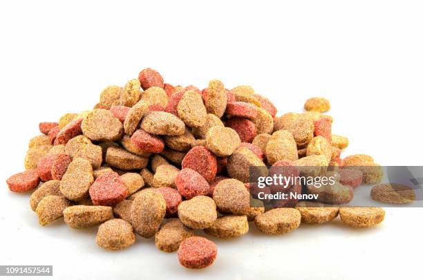 dried pet food isolated on white background - cat food stock pictures, royalty-free photos & images