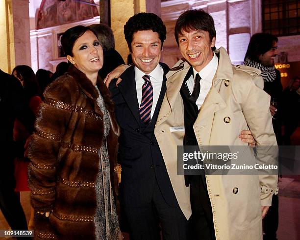 Maria Grazia Chiuri, Matteo Marzotto, Pier Paolo Piccioli attend the 'Percorso Di Lavoro' photography exhibition cocktail party held at Chiostro Del...