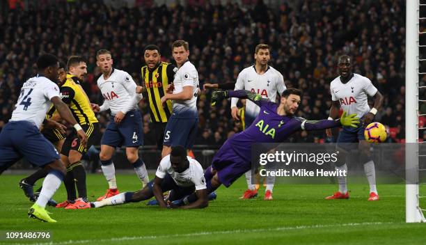 Craig Cathcart of Watford scores his team's first goal past Hugo Lloris of Tottenham Hotspur during the Premier League match between Tottenham...