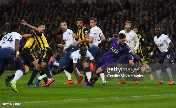 Craig Cathcart of Watford scores his team's first goal past Hugo Lloris of Tottenham Hotspur during the Premier League match between Tottenham...
