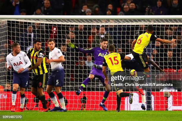 Craig Cathcart of Watford scores the opening goal during the Premier League match between Tottenham Hotspur and Watford FC at Wembley Stadium on...