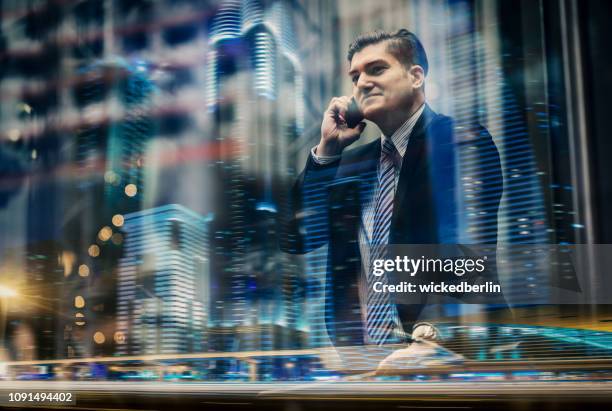 businessman and the city - dubai business stock pictures, royalty-free photos & images