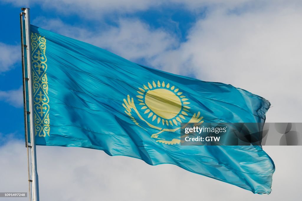 National flag in wind, Independence Park, Shymkent, South Kazakhstan Region, Kazakhstan
