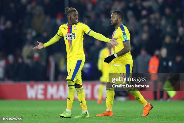 Wilfried Zaha of Crystal Palace reacts after being shown a red-card by Match Referee Andre Marriner during the Premier League match between...