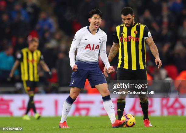 Heung-Min Son of Tottenham Hotspur celebrates after scoring his team's first goal during the Premier League match between Tottenham Hotspur and...