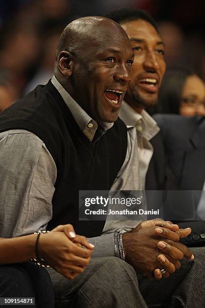 Former players Michael Jordan and Scottie Pippen of the Chicago Bulls enjoy watching a game between the Bulls and the Charlotte Bobcats at the United...