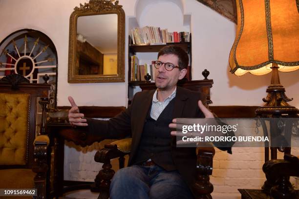French forensic doctor Philippe Charlier speaks during an interview with AFP at a hotel in Quito on January 30, 2019. - Charlier is studying the...